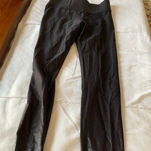 Carbon38 brand shiny snake print leggings.